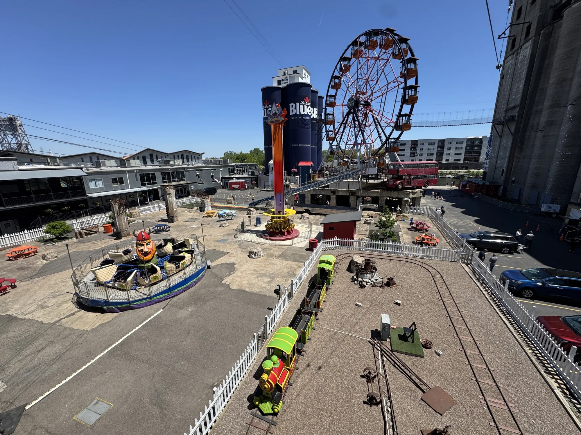 The ferris wheel, swing tower and train at Riverland