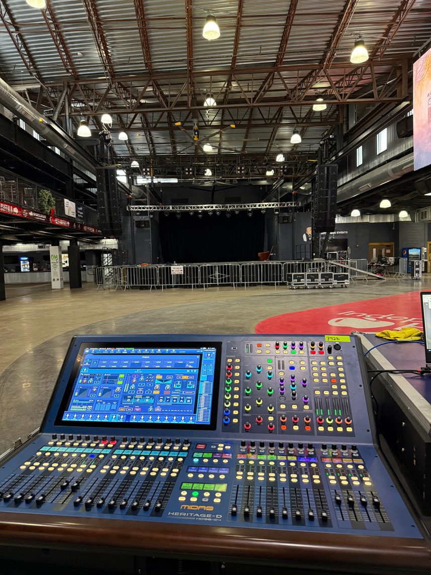 Midas HD96 front of house console facing the empty venue floor.